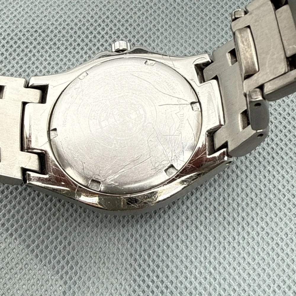 Citizen Eco-Drive Titanium E111 Solar Men's Japan Watch New Orig Battery Cell